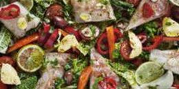Fish with vegetables baked in foil