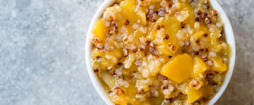 Quinoa Breakfast Bowl with Mango and Walnuts
