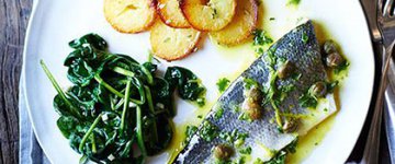 Baked sea bass with lemon caper dressing