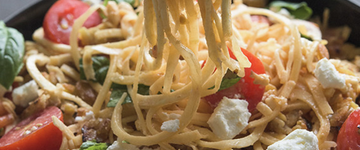 Spiralized Parsnip Noodles with Tomatoes & Cheese