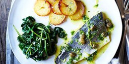 Baked sea bass with lemon caper dressing