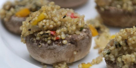 Spicy Vegan Quinoa Stuffed Mushrooms