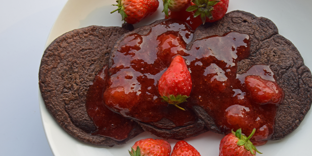 Chocolate Pancakes with Strawberry Syrup