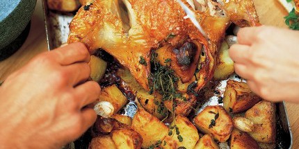 Roast chicken with lemon and rosemary roast potato