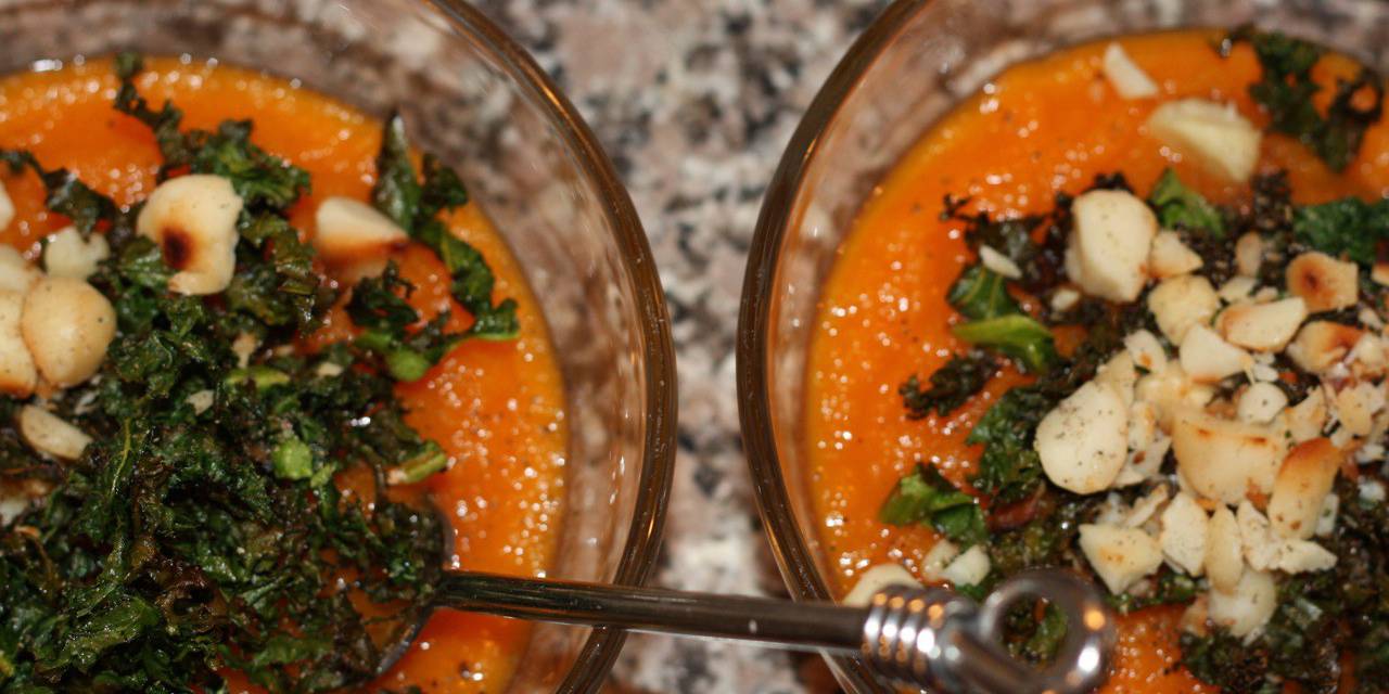 Carrot Ginger Soup with Kale Shreds and Macadamias
