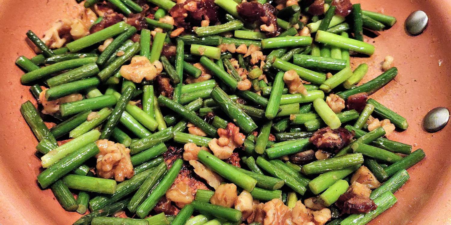 Sauteed Garlic Scapes with Date and Walnut