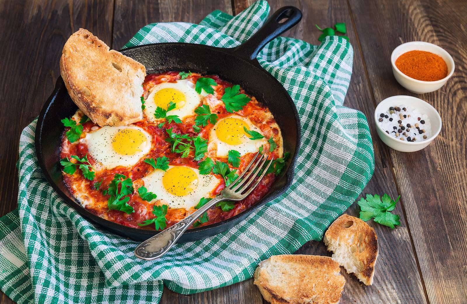 Baked Eggs Skillet With Red Peppers and Onions