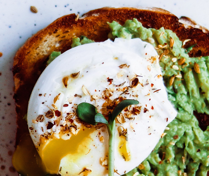 Avocado toast and dukkah with poached egg
