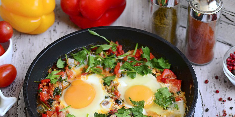 Baked Eggs Skillet With Red Peppers and Onions