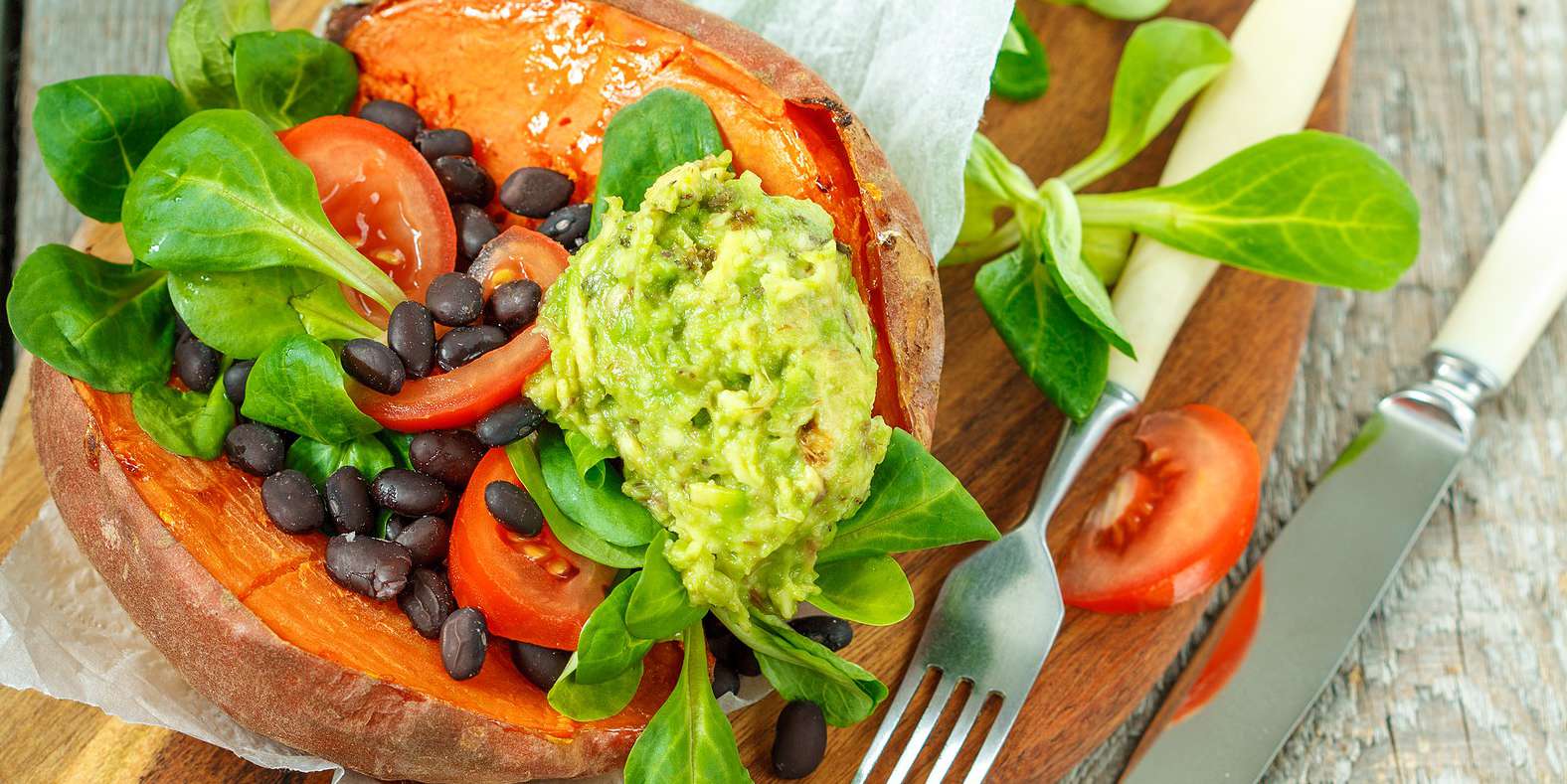 Black Bean Stuffed Sweet Potatoes with Avocado Dip